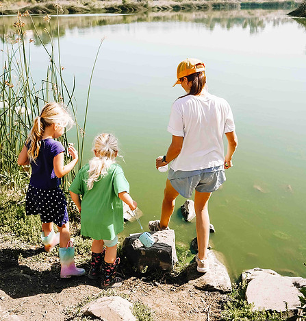 Kids learning with teacher in nature