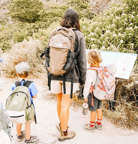 Kids learning with teacher in nature